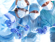 © lenetsnikolai - Team surgeon at work in operating room