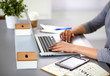 © lenetsnikolai - Young businesswoman working on a laptop