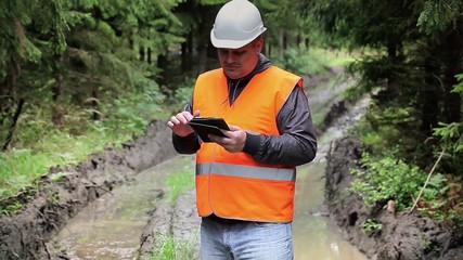 Poster - Forest officer with tablet PC