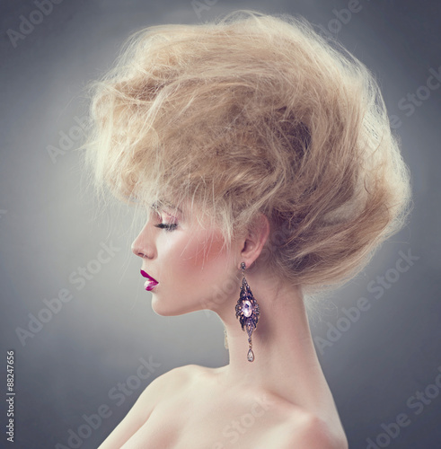 Fototapeta na wymiar High fashion model girl with updo hairstyle