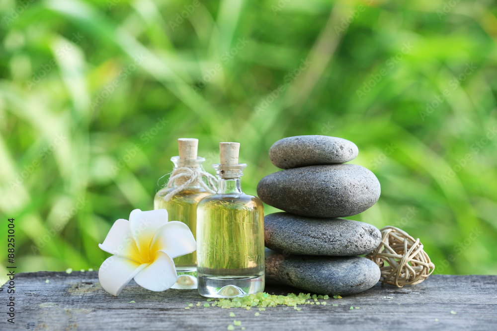 Spa still life on wooden table on river