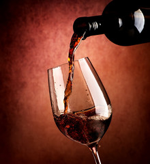 Wall Mural - Wine on brown background