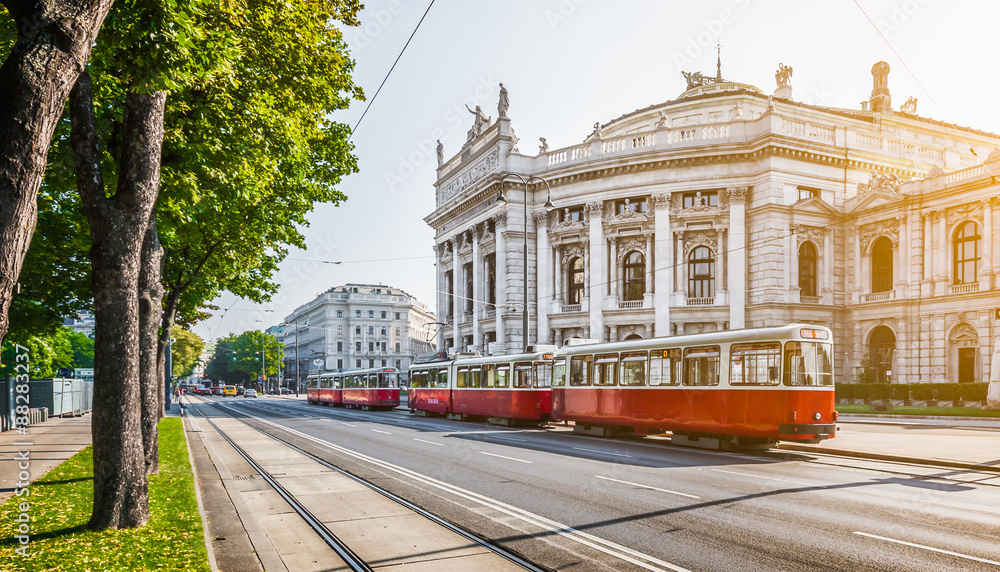 Wiener Ringstrasse with Burgtheater and tram at sunrise, Vienna, Austria - obrazy, fototapety, plakaty 