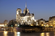 Notre Dame Cathedral And River Seine At Night, Paris, Ile De France, France 