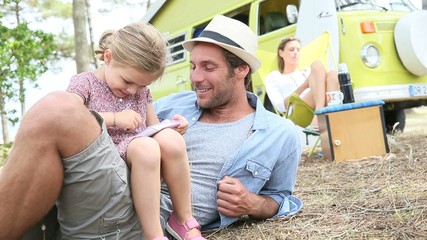 Wall Mural - Daddy with daughter playing together on vacation