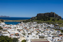 Panoramic View Of Beautiful Lindos Village With Its Castle (Acropolis), Rhodes, Dodecanese Islands, Greek Islands, Greece