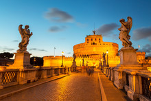 Angel Statues On Ponte Sant' Angelo Bridge With Castel Sant' Angelo At Dusk, Rome, Lazio