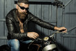 © Volodymyr - Unshaven male biker