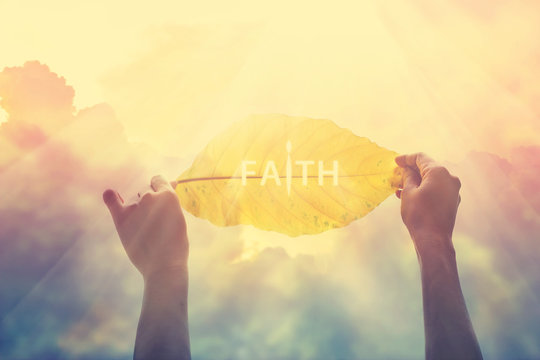 abstract, holding a yellow leaf in the clorful sky of faith, vintage tone