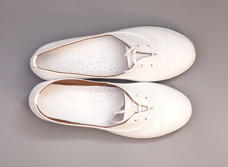 White Shoes isolated on gray  background