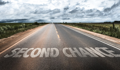 Second Chance written on rural road