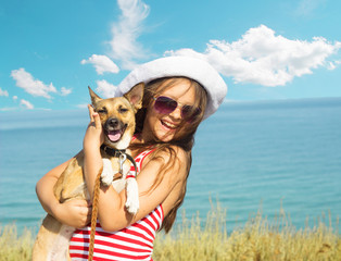 Wall Mural - child and dog and sea