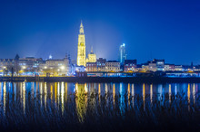 Night View Over Illuminated City Of Antwerp In Belgium Taken From The Opposite Shore Of The River Scheldt/schelde.