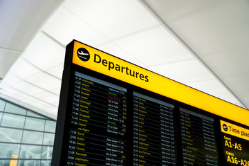 Fototapete - Flight information, arrival, departure at the airport, London, E