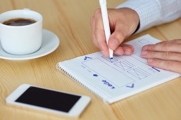 Wall Mural - man sketching web design