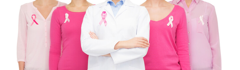 Wall Mural - close up of women with cancer awareness ribbons