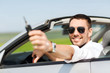 © Syda Productions - happy man in cabriolet showing car key