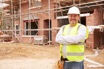 Portrait Of Construction Worker On Building Site