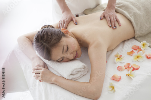 Fotografie, Obraz Young woman has received the aroma oil massage