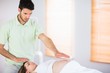 © WavebreakMediaMicro - Relaxed pregnant woman getting reiki treatment