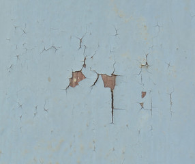 Background texture of the old cracked wall with peeling paint