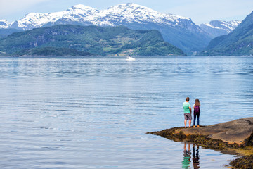 Wall Mural - tourist girl at the Hardangerfjorden