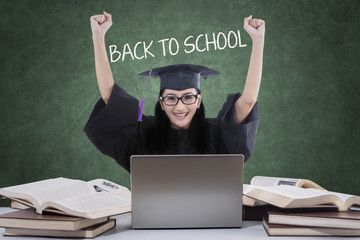 Wall Mural - Successful student with mortarboard back to school