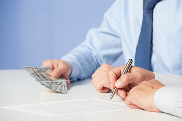 Businessman signing a contract