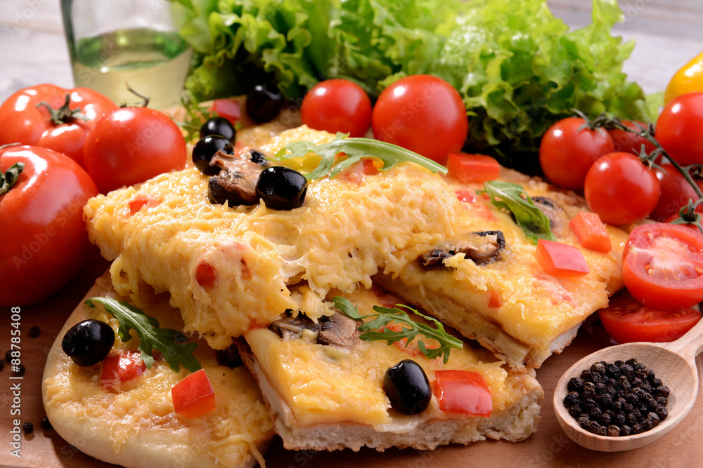 Delicious homemade pizza on table close-up
