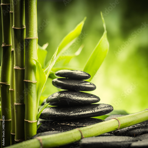 Nowoczesny obraz na płótnie spa concept with zen basalt stones and bamboo