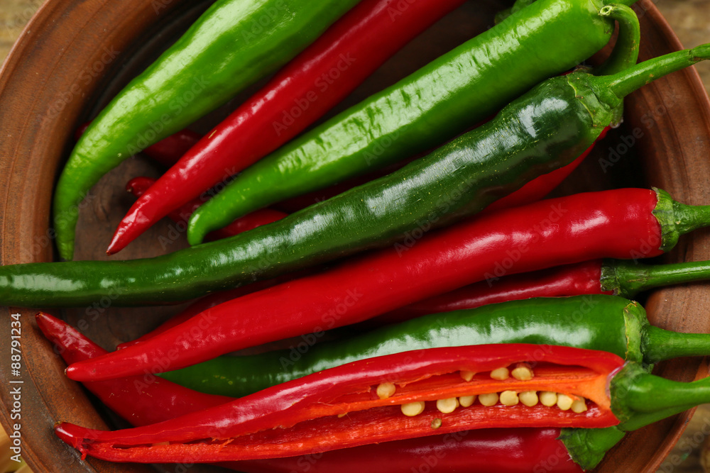 Hot peppers in bowl close up