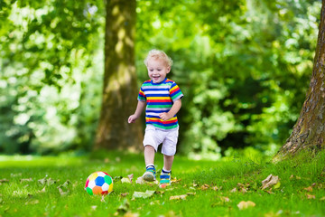 Poster - Kids playing football in school yard