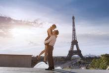 Cheerful Romantic Couple At Trocadero Near Eiffel Tower