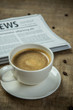 © DN6 - Close up glasses on newspaper and Coffee on the wooden table in