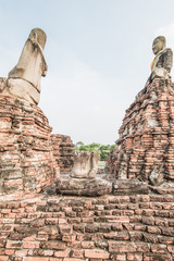 Ancient buddha statue and ancient pagoda at Chaiwathanaram Templ