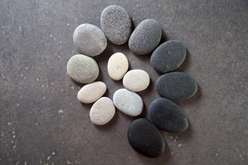 Stones spiral on black background