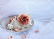 sugar roses on a white veil