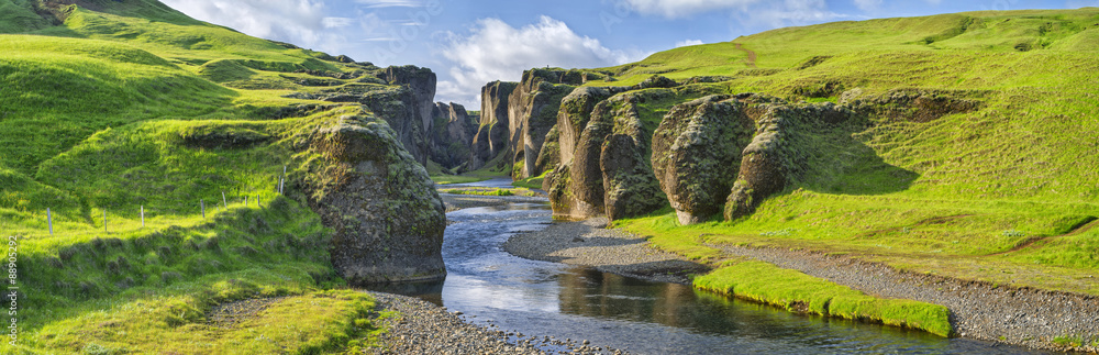 green hills of canyon with river and sky in Iceland - obrazy, fototapety, plakaty 