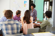 © Monkey Business - Female Manager Leading Brainstorming Meeting In Office