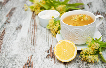 Sticker - cup of herbal tea with linden flowers