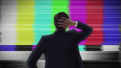 Aufkleber - Businessman looking at static tv