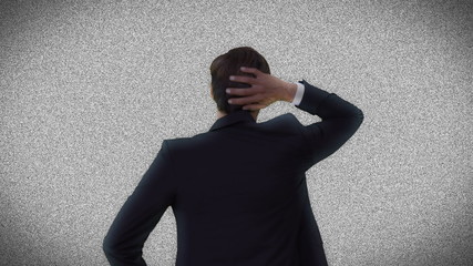Aufkleber - Businessman looking at static tv