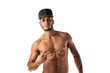 Handsome young man naked, wearing baseball hat in cool pose