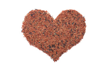 Wall Mural - Red camargue rice in a heart shape