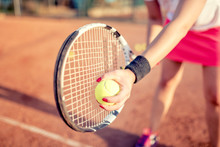Close Up Portrait Of Tennis Racquet With Fitness Girl. Healthy Training For Sportswoman Details