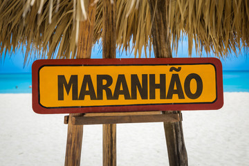 Wall Mural - Maranhao sign with beach background