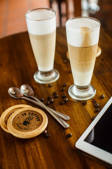 2 latte on a wooden table