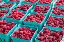 Ripe Red Raspberries At The Market