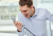 © Syda Productions - furious businessman calling on phone in office