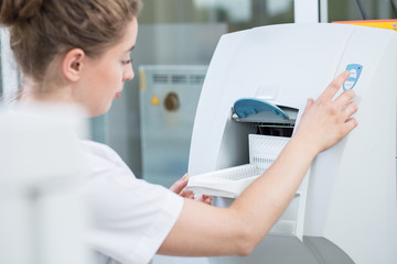 Lab technician using modern equipment